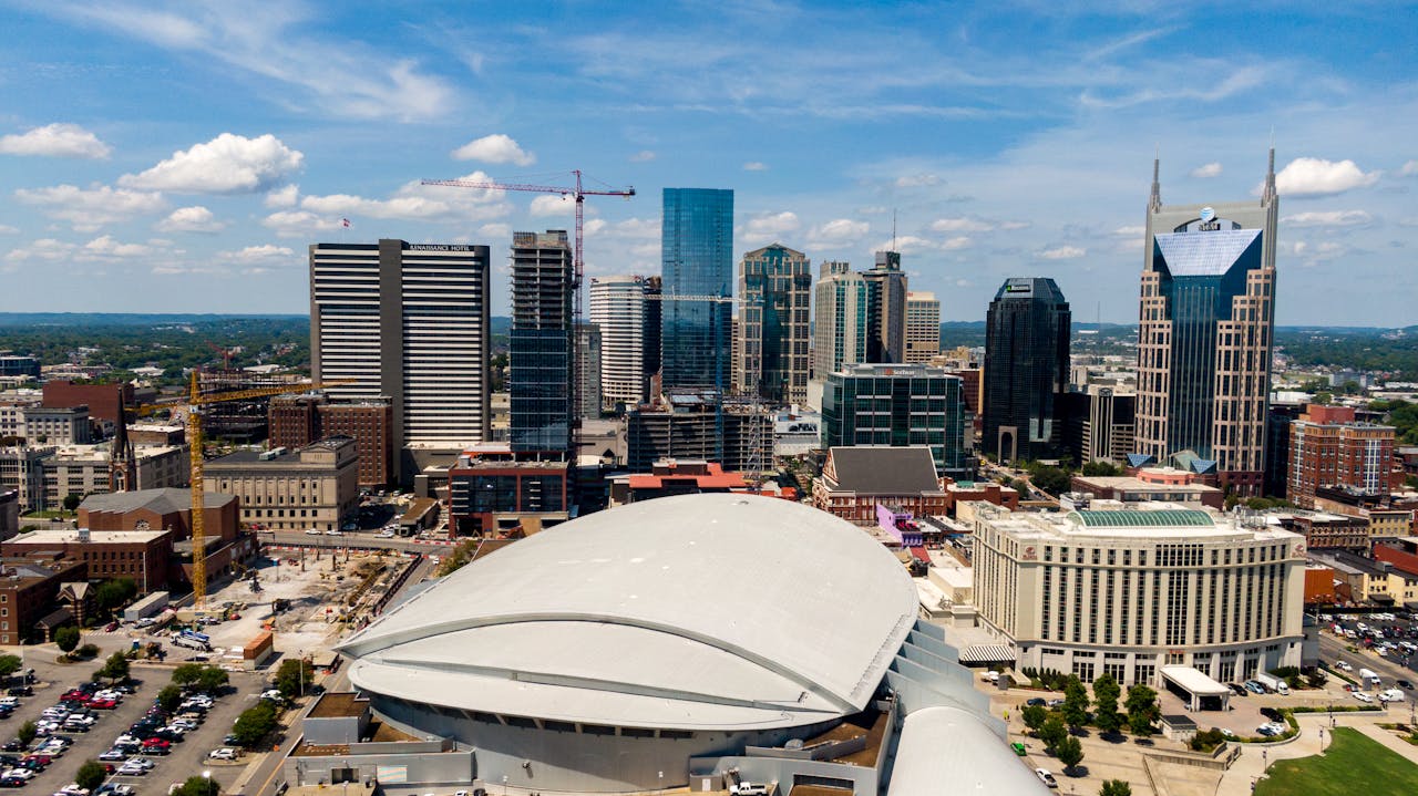 services-03 Aerial view of Nashville skyline featuring modern skyscrapers and downtown architecture.